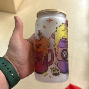 Spooky glass with a straw and bamboo lid